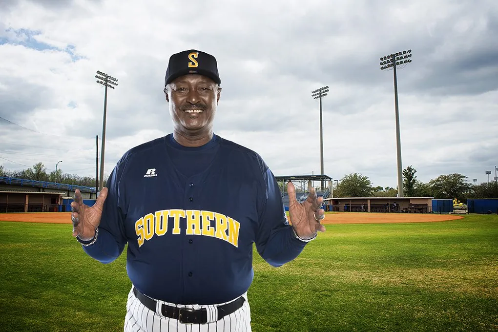 Environmental portrait of a baseball coach on the field