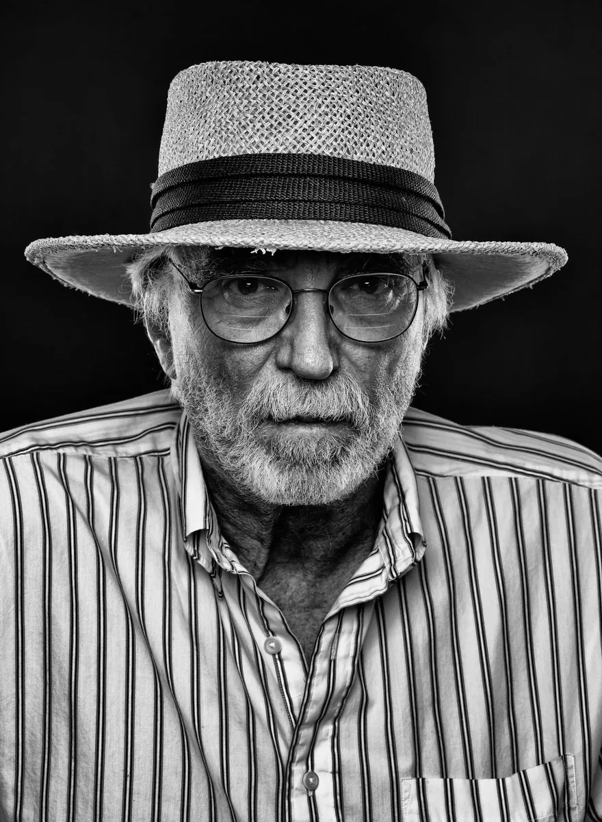 Black and white studio portrait of Ed Pramuk